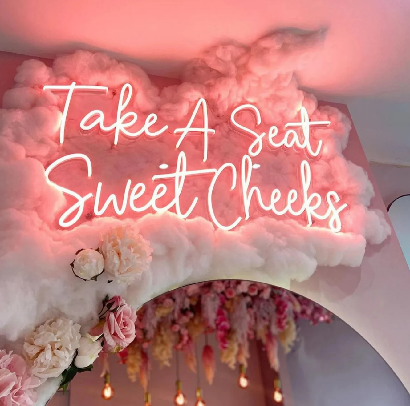 Take a seat sweet cheeks neon sign
